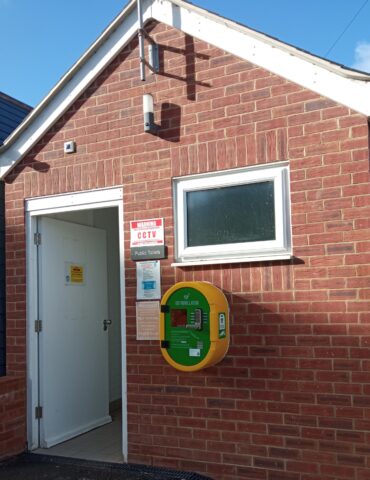 Defibrillator on wall of Seagrove bay toilets